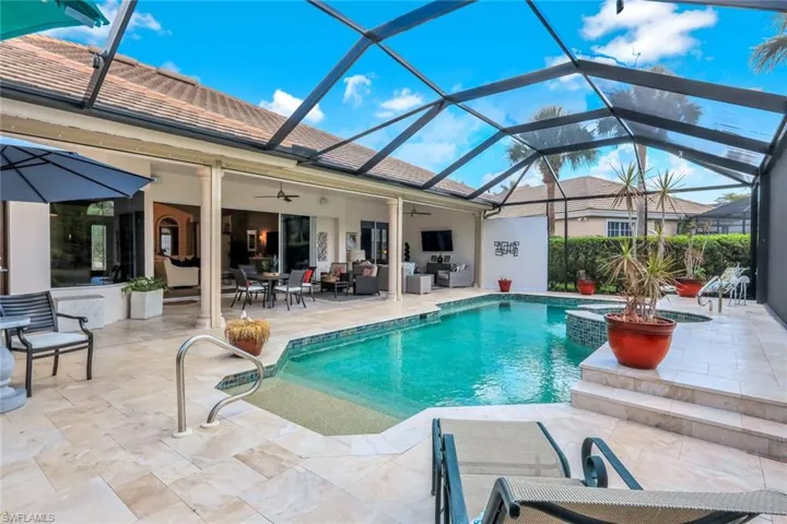 Renovated pool area with electric storm protection ( great space to store your lanai furniture)