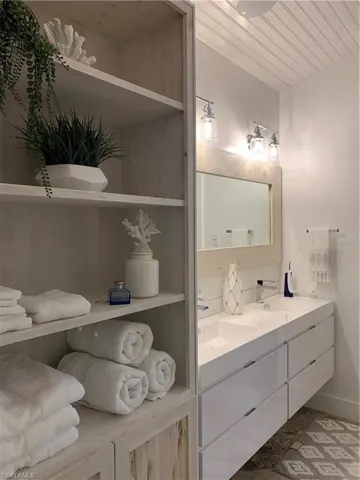 Master bath with shower and soaking tub.