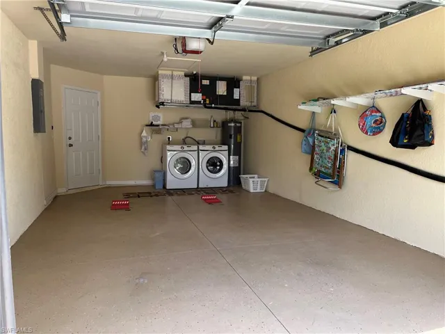Left side of duplex 4614 has a new front load Samsung washer & dryer set.