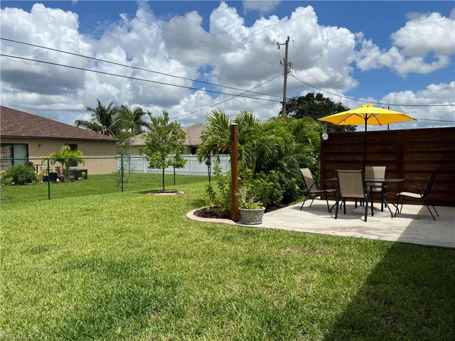Fenced back yard and patio