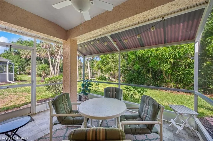 Covered & screened lanai (now freshly painted white)