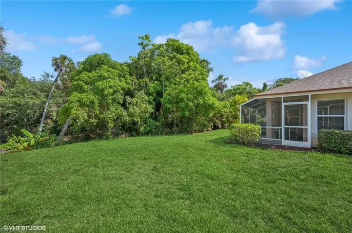 Spacious yard with preserve view. (exterior paint is now white)