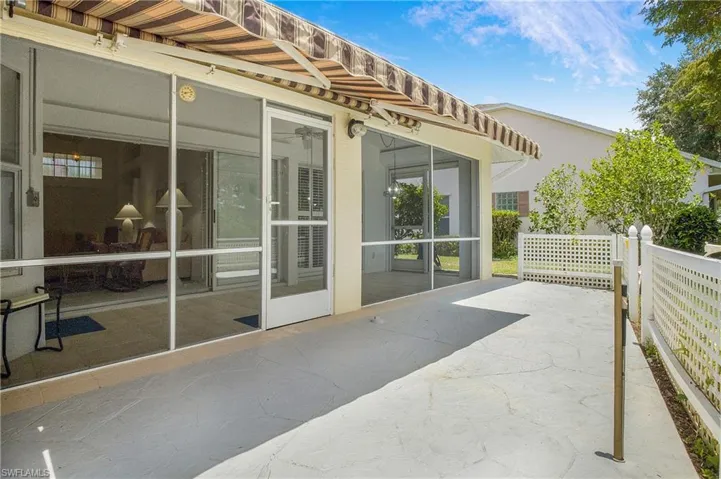 View of patio / terrace with retractable awning
