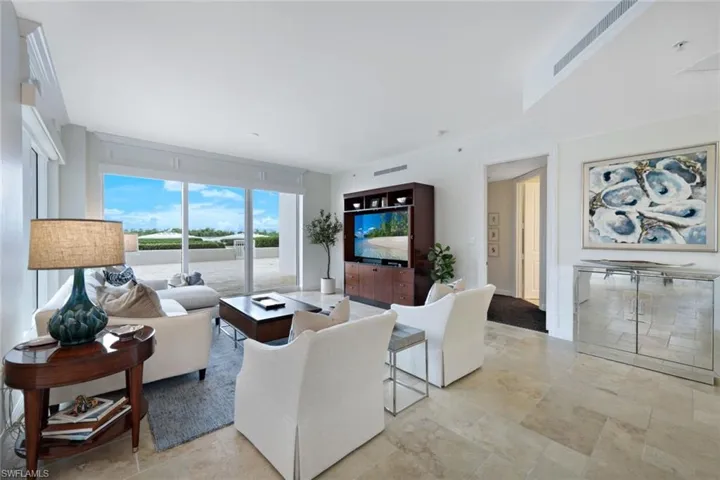 The sliding glass doors allow you to be one of only 5 residences that live like a patio home.