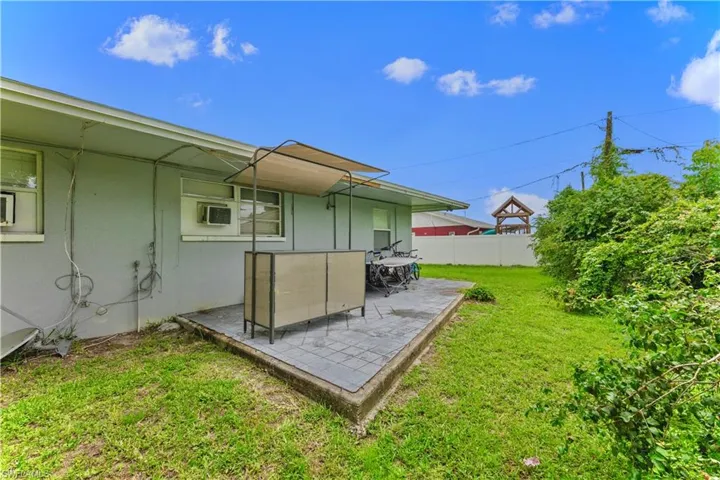 View of yard with a patio
