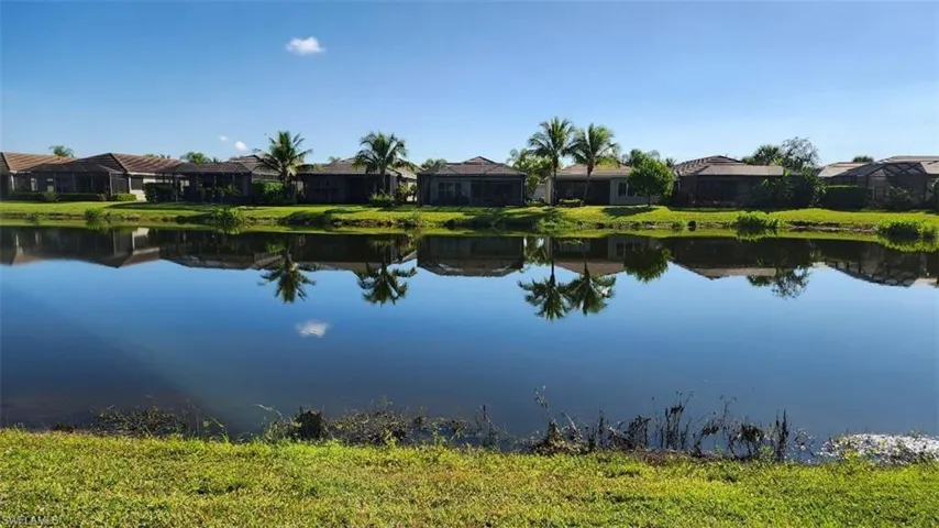 Water view featuring nearby suburban area