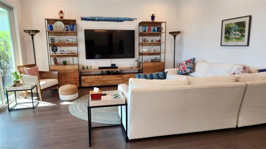 Living area with wood finished floors
