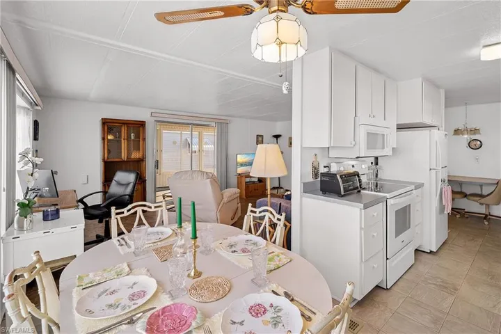 Dining room with a ceiling fan