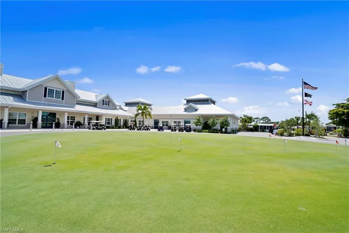 View of property's community featuring an area to practice putting