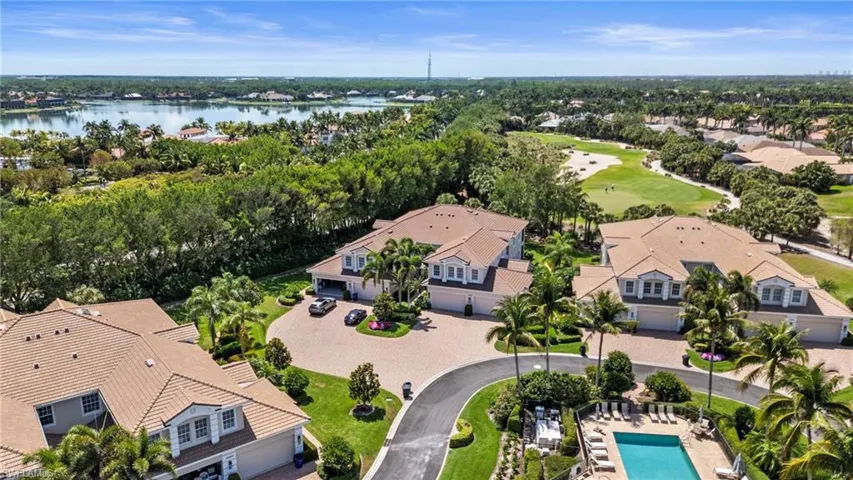 Drone / aerial view featuring a water view and a residential view