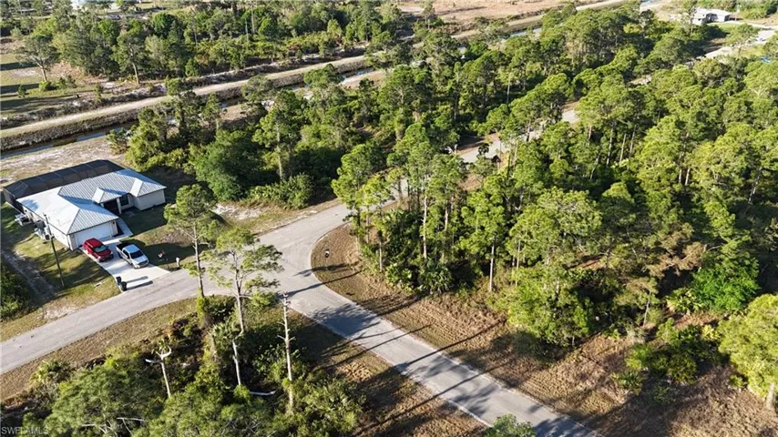 Bird's eye view with a wooded view
