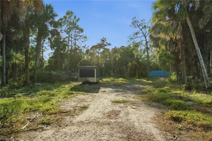 Versatile cleared rear space perfect for storage shed, accommodating boats, RV's or recreational equipment