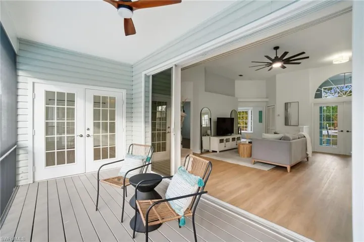 Effortless flow from the living room to the screened lanai creates the perfect setting for relaxing, entertaining, and enjoying Florida living.