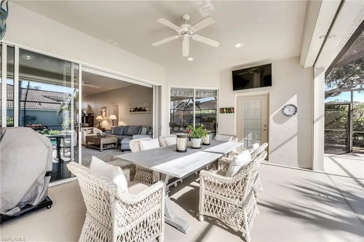 View of patio / terrace with ceiling fan and an outdoor living space