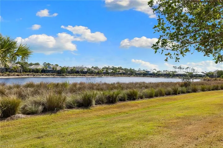 Water view featuring nearby suburban area
