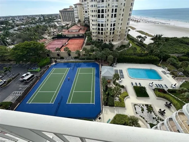 Drone / aerial view of waterfront with a beach