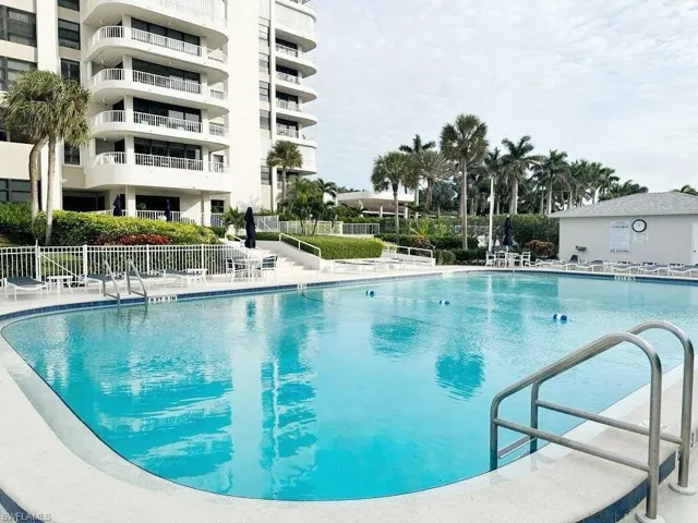 Community pool featuring a patio area