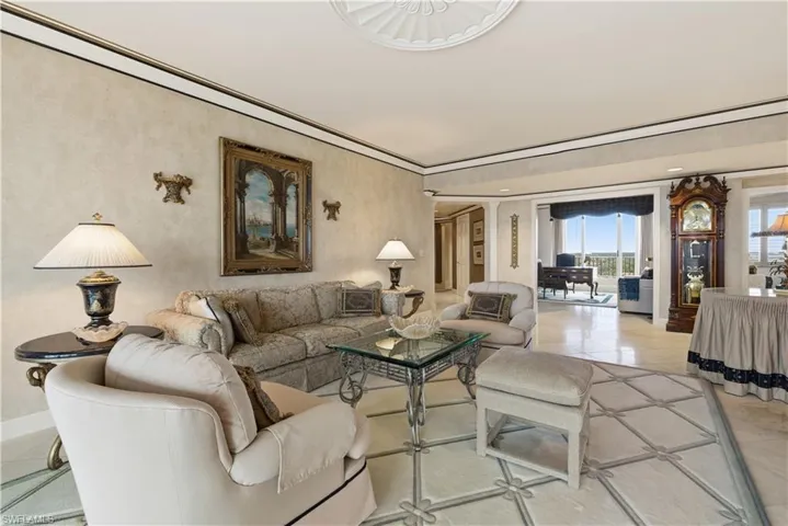 Living room featuring light tile patterned floors