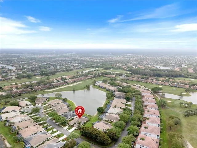 Drone / aerial view featuring a water view and a residential view