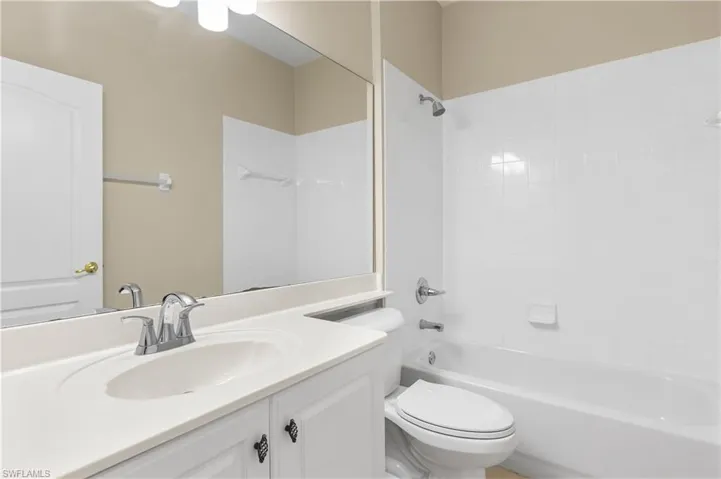 This is your 3rd full bathroom with bathtub / shower combination, vanity. This is located on the first level right outside the 5th bedroom.