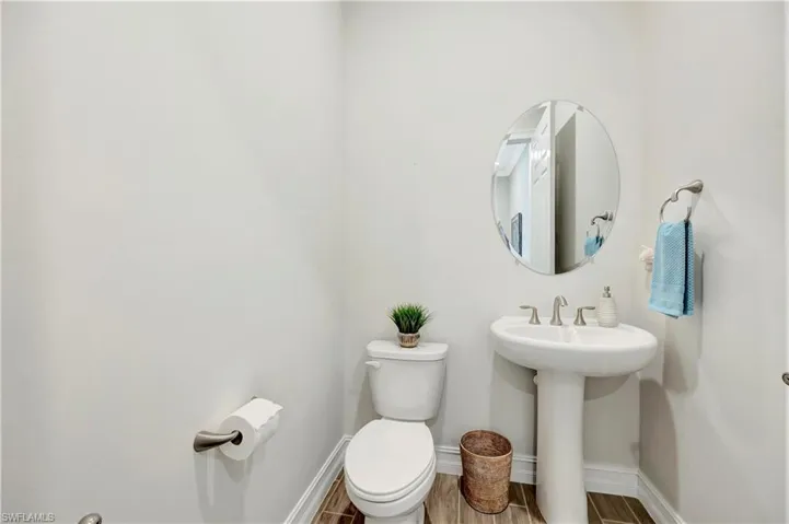 Bathroom featuring sink and toilet