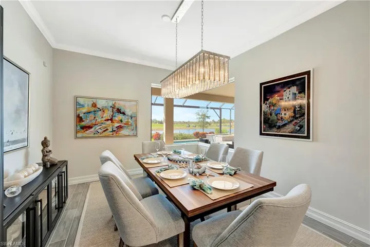 Dining area featuring ornamental molding