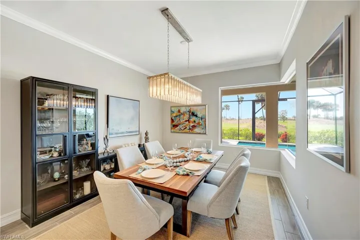 Dining room featuring ornamental molding