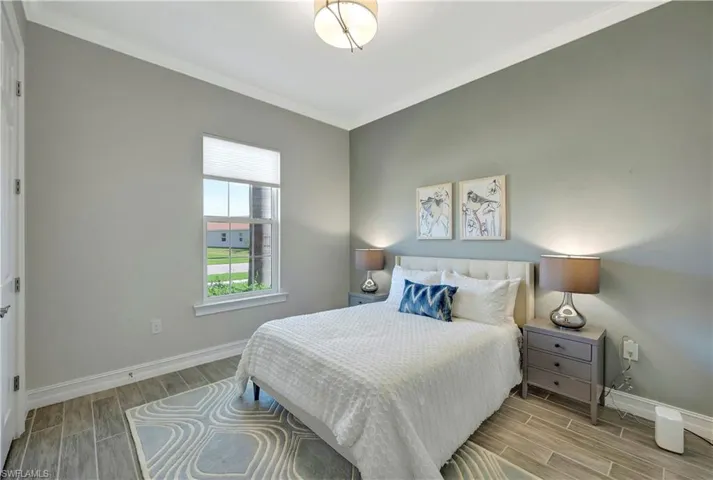 Bedroom featuring ornamental molding