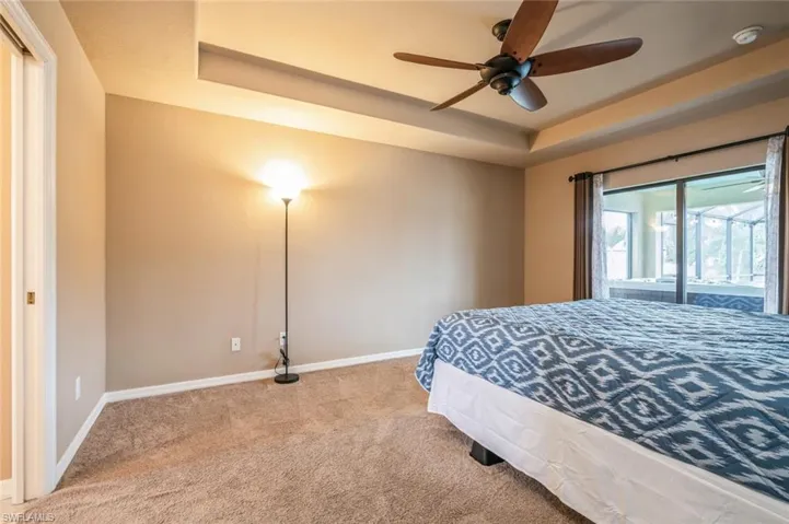 Sliding Glass Doors to Access/View Lanai; Double Closets in hallway (left)