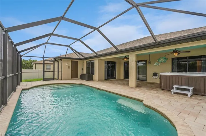 Screen-enclosed Lanai with Pool, High-end Hot Tub, pavered deck