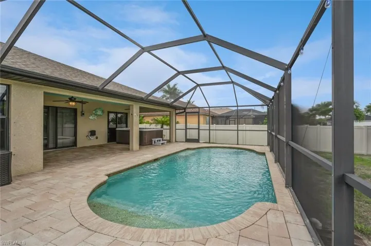 Screen-enclosed Lanai with Pool, High-end Hot Tub, pavered deck