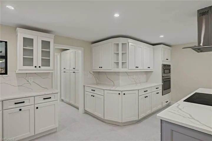 Kitchen with Quartz counters and lots of counter & cabinet space!