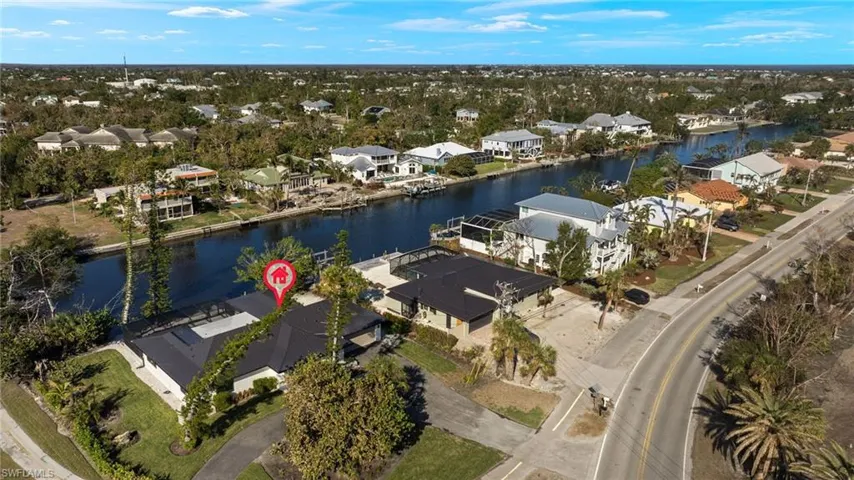 Aerial view featuring a wide canal view