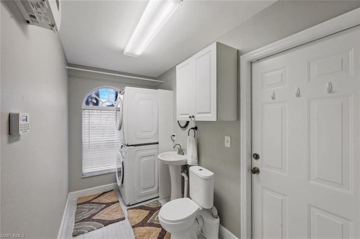 Laundry room with an added 1/2 bath for guests