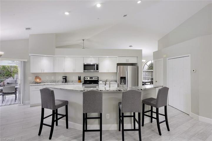 Modern updated kitchen with shaker cabinets and all stainless appliances await you!