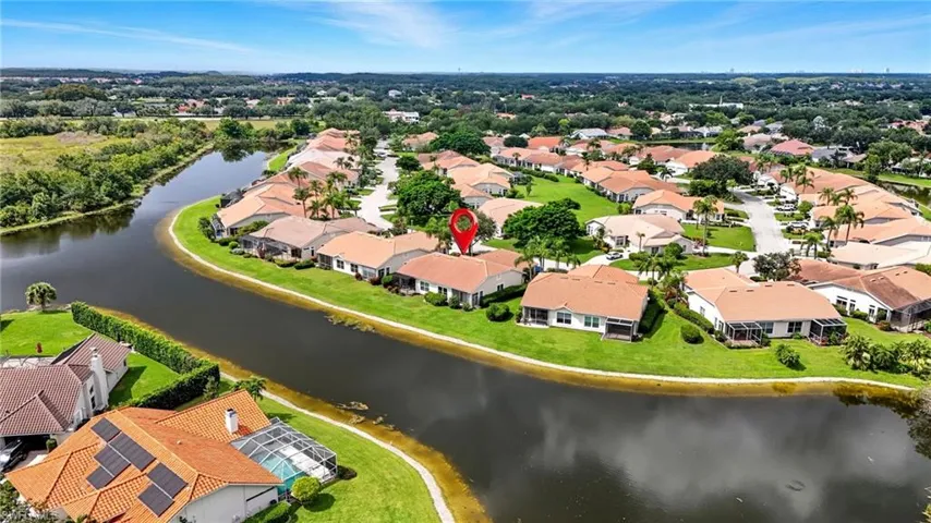 Aerial view of residential area with a large body of water