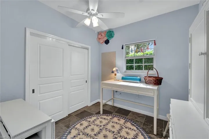 Hobby room with ceiling fan
