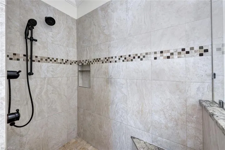 Bathroom with tiled shower
