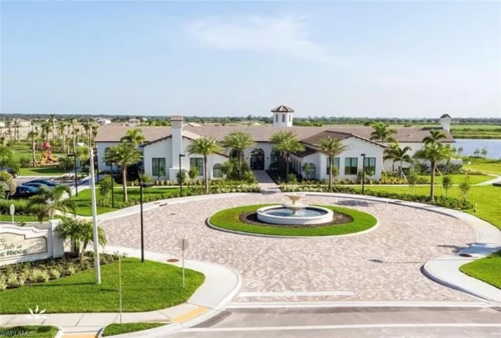 View of property's community featuring a lawn