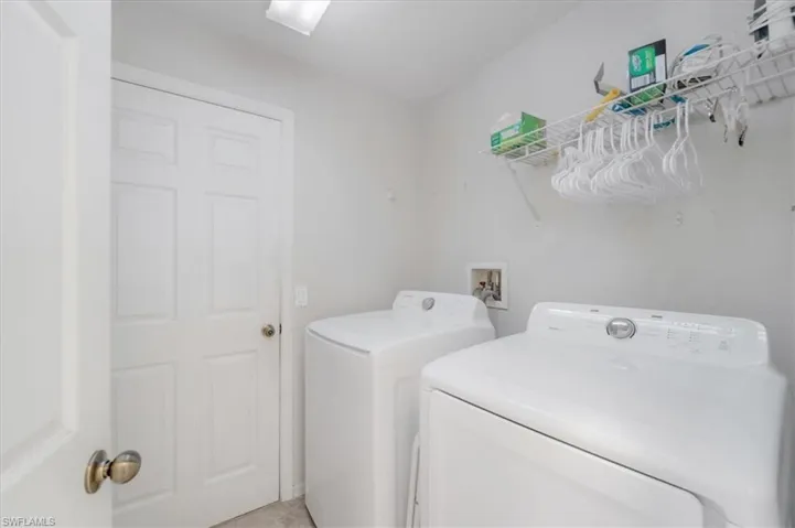 Clothes washing area with separate washer and dryer