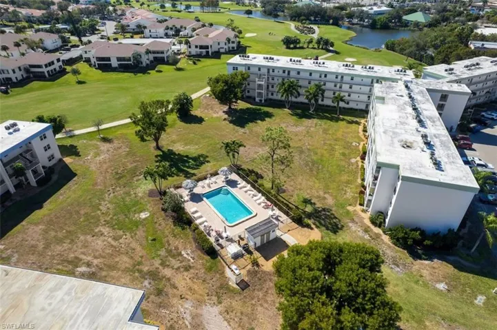 Aerial view of a nearby body of water and a local golf course