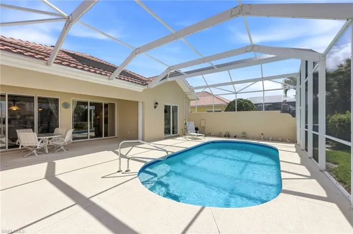 Pool in fully screened-in Lanai
