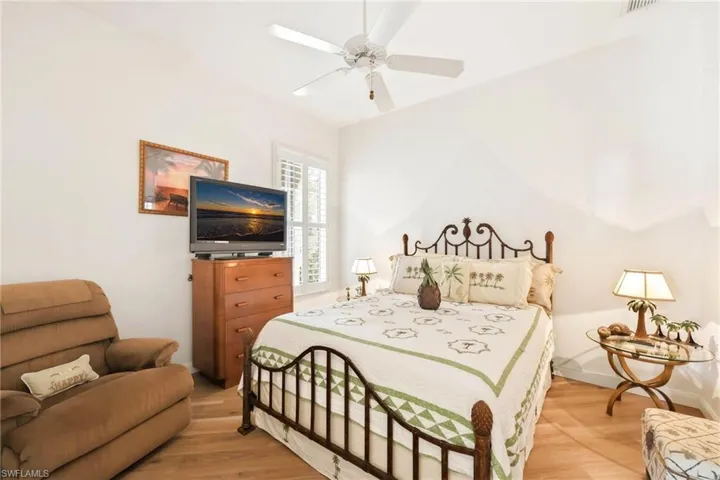 Bedroom  #2 with wood flooring