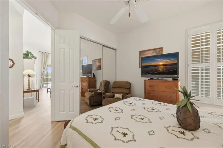 Bedroom #2 with French Doors and wood flooring