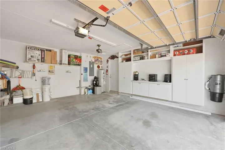 2-Car Garage with brandnew Waterheater, Central Vac and custom cabinets