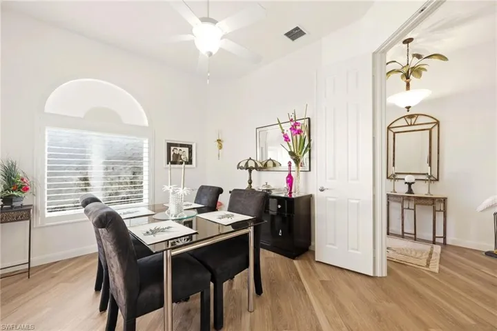 Den, furnished as additional Dining Area