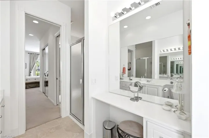 Master Bathroom split in "hers" and "his" areas and access to the shower