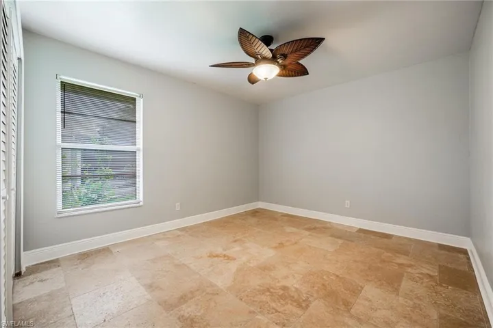 Spare room featuring ceiling fan