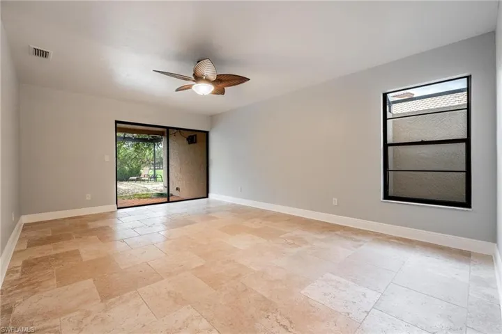 Spare room featuring ceiling fan