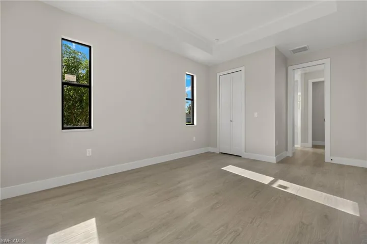Spare room with light wood-type flooring